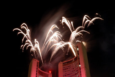 White Streaks Atop Red Building