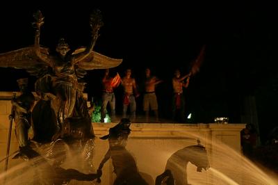 Fraternity guys celebrating at Littlefield Fountain