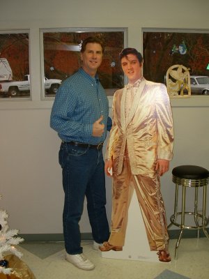 With Elvis in his museum, Tupelo, Mississippi, USA