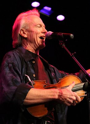 Tom Rigney leads his band Flambeau