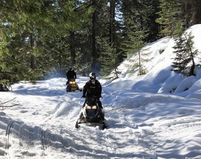Snowmobilers on Browns Ravine Road, which connects Skyway to West Branch Feather River