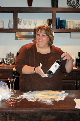 Donna shows off a new use for a wine bottle