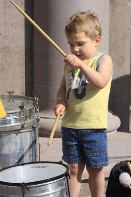 Zach, a 3-year-old drummer, joins the band