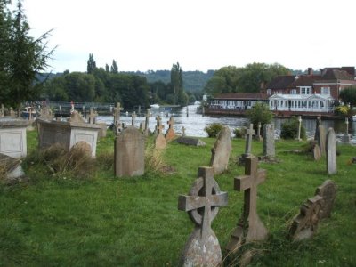 The river Thames just beyond the graveyard!