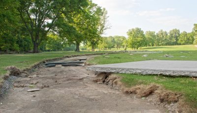 Slab on grass 30' from pathway
