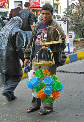 A street vendor of baskets and plastics4437