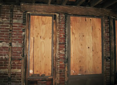 Two windows, with lines above left by the lath7825