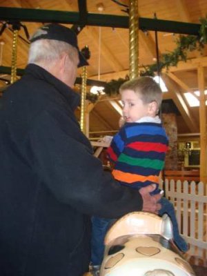 joey and grandpa on the carousel ride