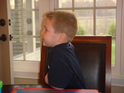 watching in anticipation of his cake