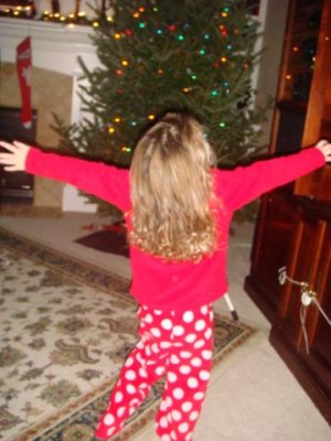 singing and dancing in front of the tree