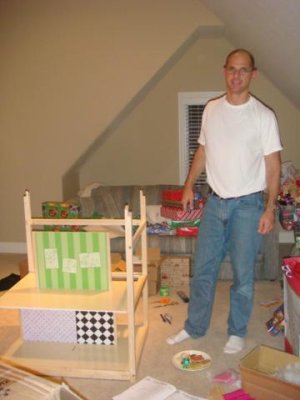 jeff starts to assemble the dollhouse