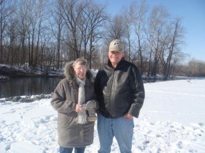 mom and dad strike a winter pose