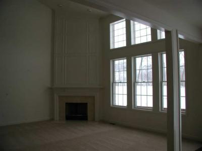 view from hearth area of family room.No crown molding- 3, 2- story windows