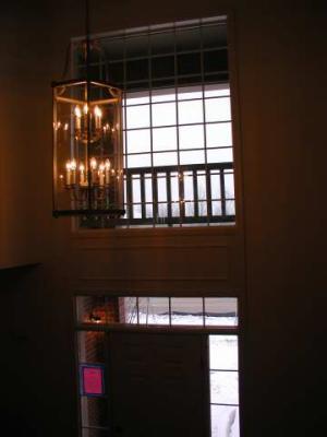 view from stairs, of upper foyer