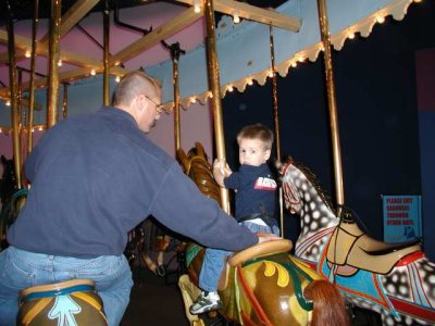joey's first solo carousel ride on a horse