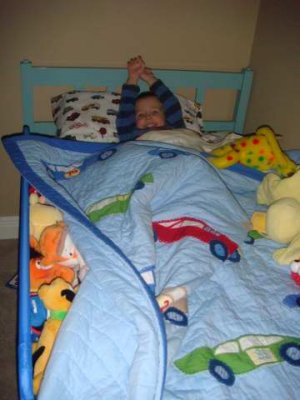 joey in his big boy bed- he likes it!!