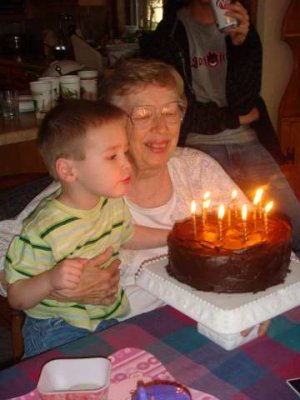 helping grandma blow out her birthday candles (there was a fair amount of spit on that cake!)