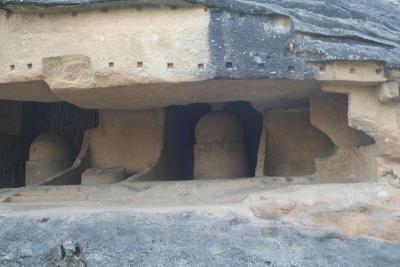 Cave with small stupas