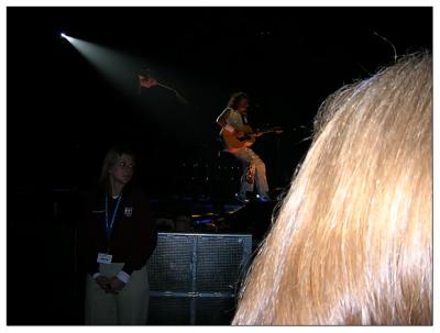 Brian May with my wife looking on