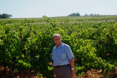 Dr.Harran Zuraikat in his Vineyard.JPG