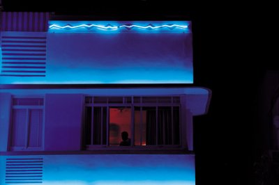 Man in window at nite