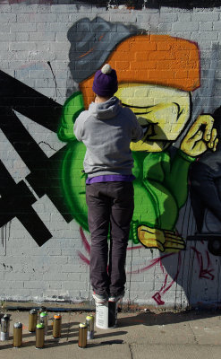 Beware graffiti artist at work