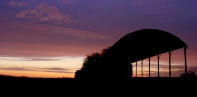 Sunset over old barn