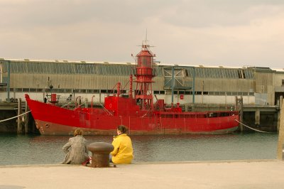 Contemplating the old red boat.jpg