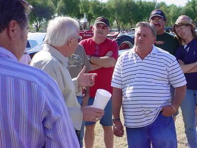 Stanley discussing  policy for auction