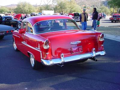 Guy's red 55 Chevy