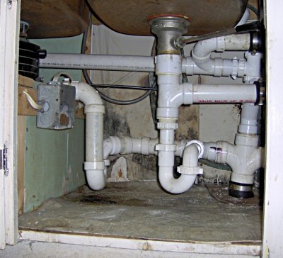The cause of this plumbing problem is TRAPPED within!