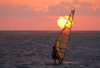 Windsurfing to the sun's last rays