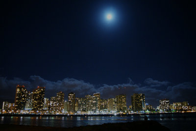 Waikiki at night with an almost full moon