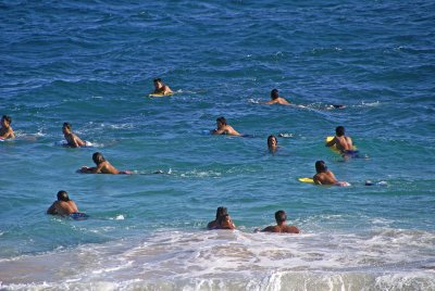 The guys are waiting for the waves