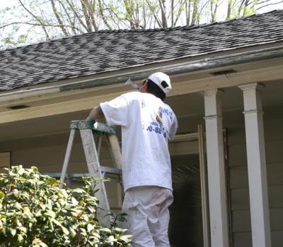 Painter in Front of House.jpg