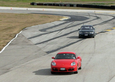 Kurt and Jim swing out of the last turn