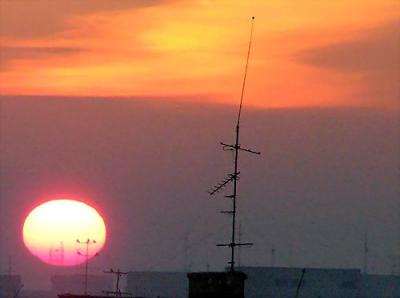 Sunrise over roofs