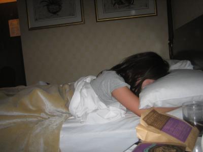 tina enjoys the scent of hotel pillows