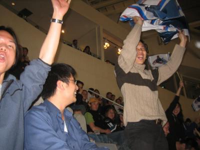 lonnie's fans proudly wave the Vancouver banner after a goal