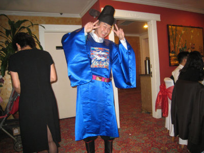 mike putting on his korean outfit