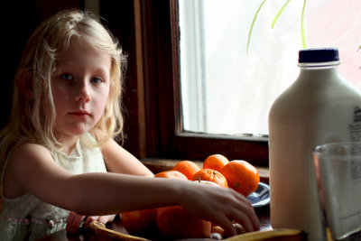 Girl with Oranges and Milk