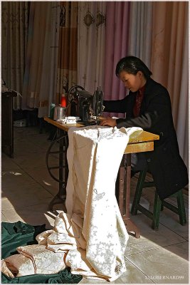 SEWING WOMAN