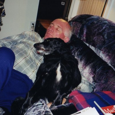Gem Catching a snooze with Dad when she was not snuggled with Mom