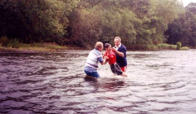 Baptism ceremony in the river