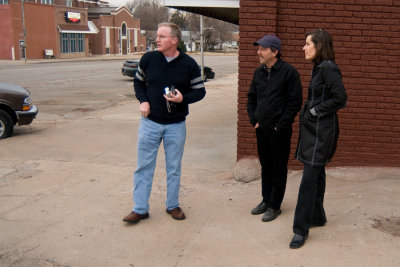 Art McSweeney, Dave and Audrey looking at potential buildings for mural project