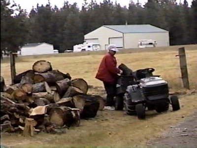 Opie downloading firewood.  All this wood is from today.jpg