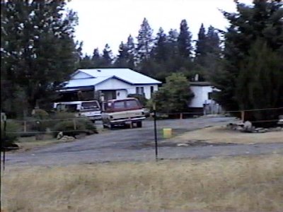 Our place looking from Kips driveway next door.  The fence is between our propertys.jpg