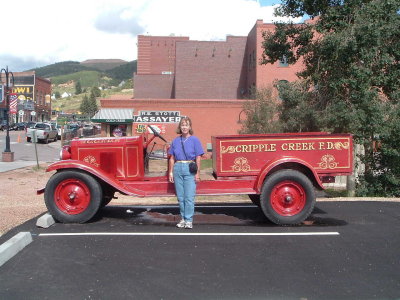 Donna with fire truck at Cripple Creek.jpg