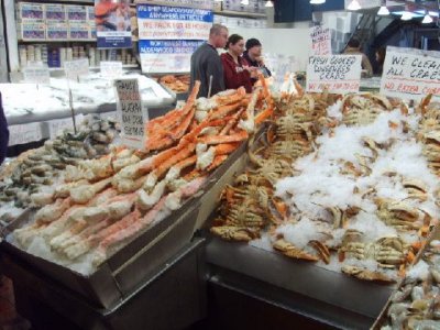 King crab and Dungress crab at fish market in Seattle Pikes Market.jpg