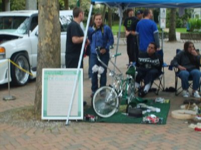 Patrick being interviewed with his show bike.jpg